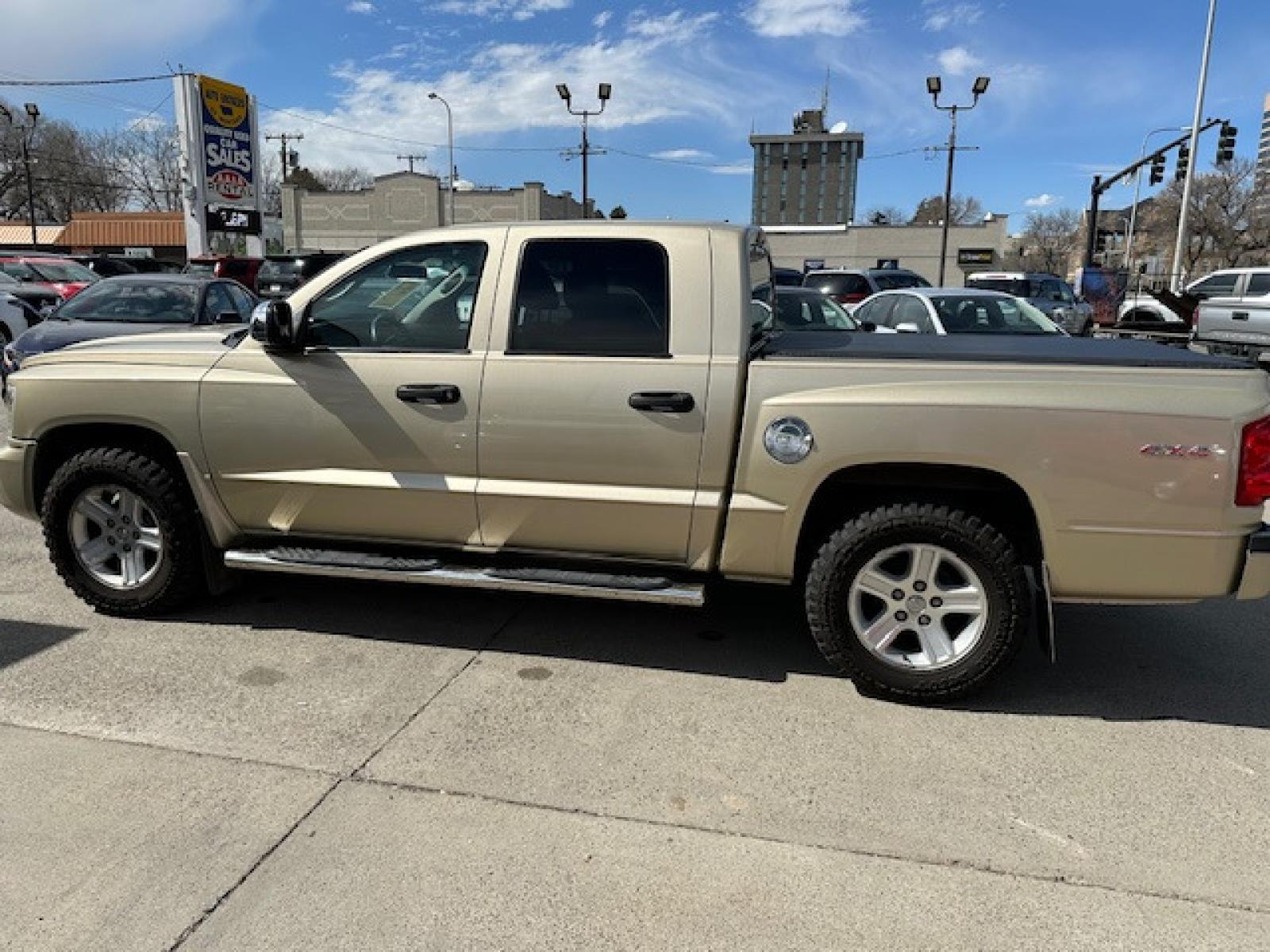 2011 /BEIGE Dodge Dakota SLT (1D7RW3GK3BS) with an 3.7 V6 engine, Automatic transmission, located at 3200 1st Avenue North, Billings, MT, 59101, (406) 245-9055, 45.779270, -108.510742 - Very Nice 4 Door Pickup with A Ton of Options! Power Windows, Power Door Locks, Remote Key Entry, Rugged Terrain Tires, Tilt Steering Column, Cruise Control, 4X4, Running Boards, Tonneau Cover, Towing, Custom Bumper Guard and Only 79,000 Miles. CarFax Dealer Auto Brokers of Montana/AA&A Auto Renta - Photo #4